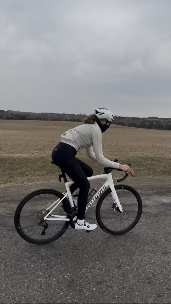 Rider climbing a quiet farm road on the Brooklin to Port Perry loop