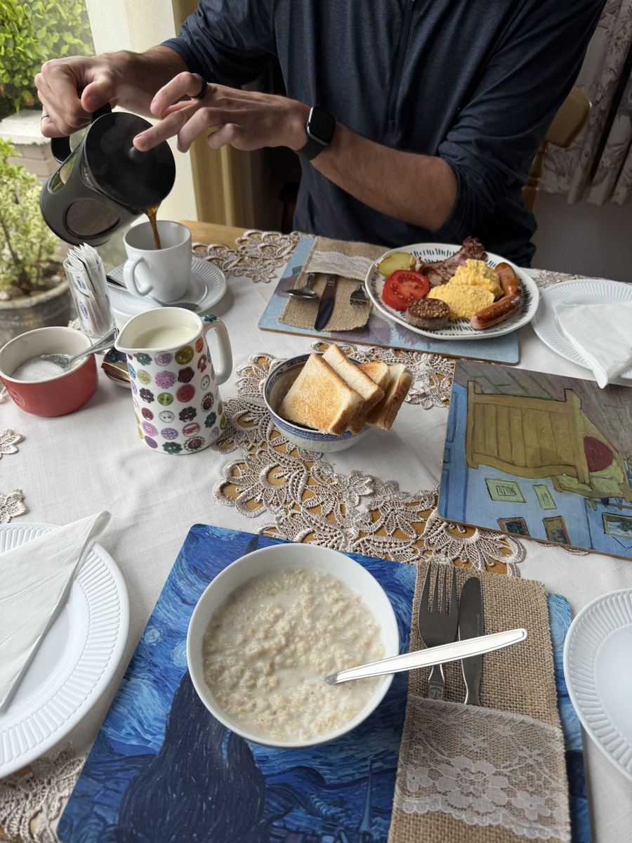 A full Irish breakfast with porridge, toast and fresh coffee