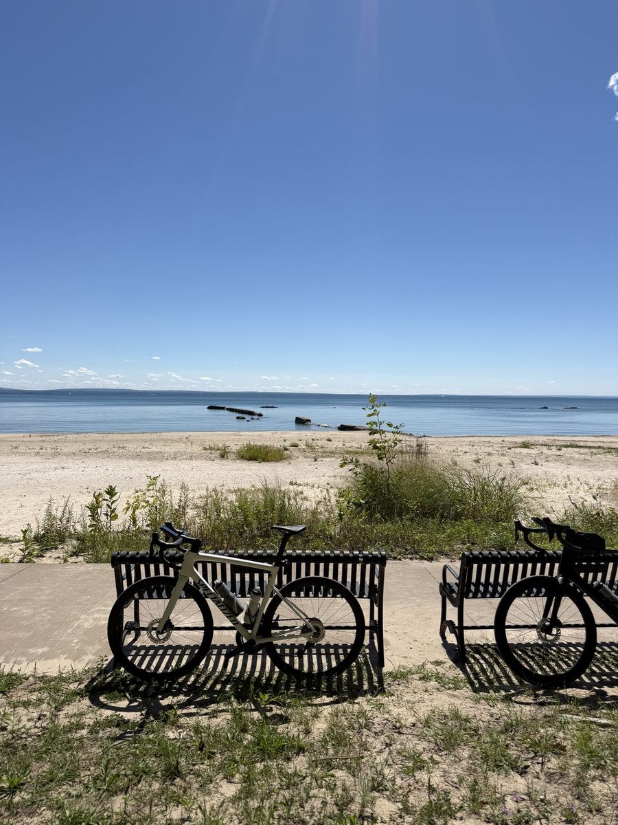 Two bikes at Waverly Beach Park with Lake Erie and the Erie Beach ruins behind