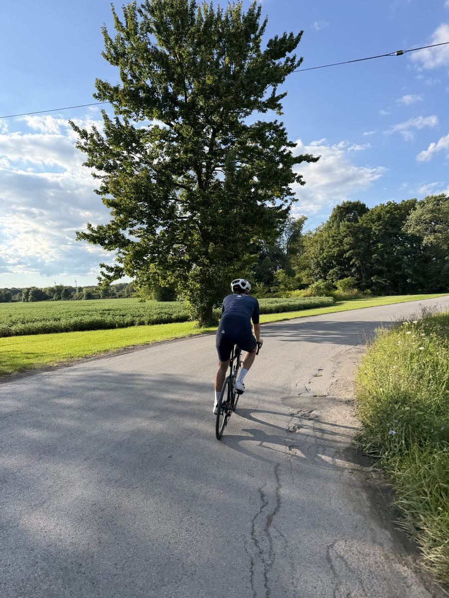 Riding past farm fields on the Villages Loop in Pelham