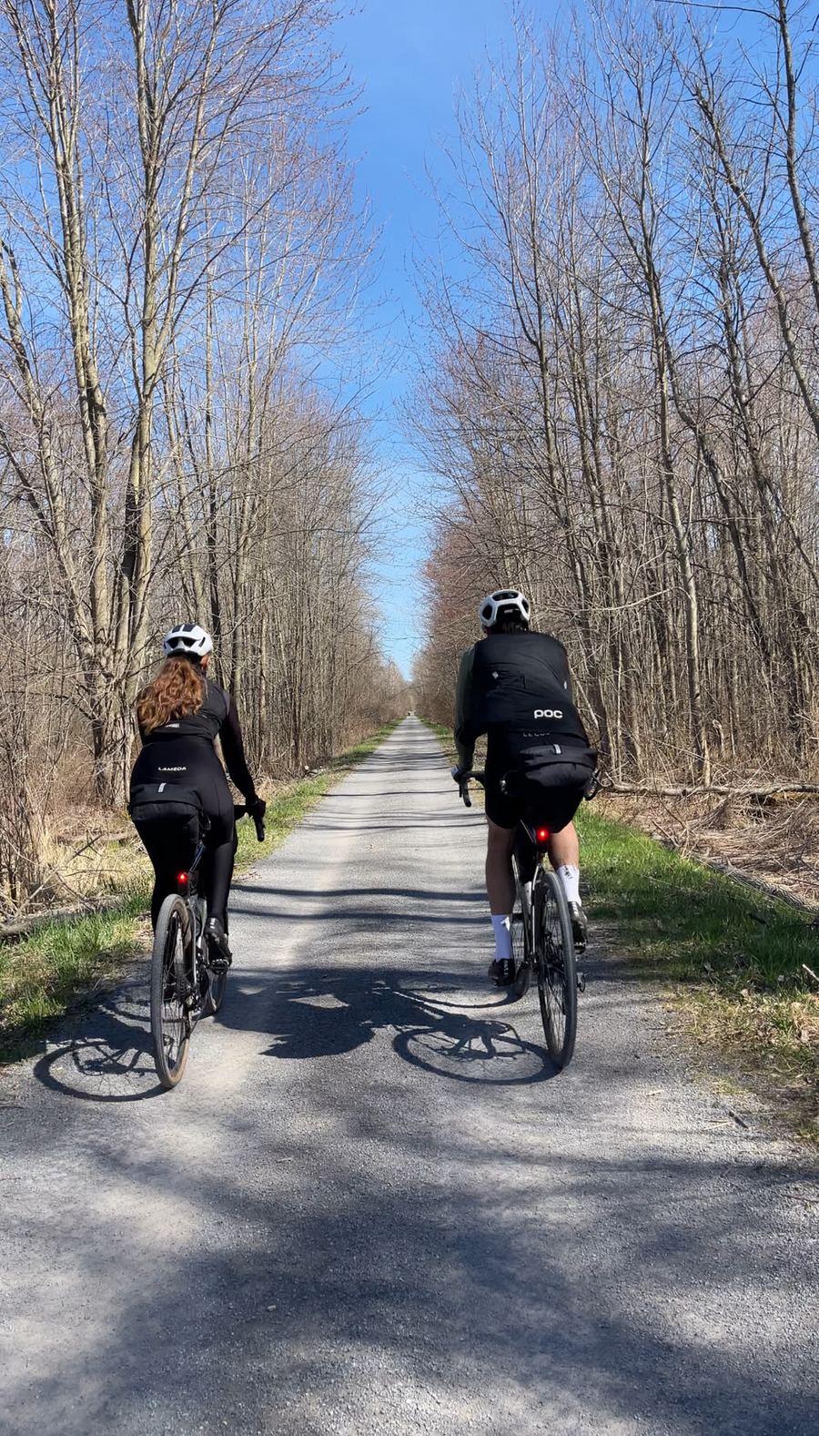 Riding the tree-lined gravel Millennium Trail through Prince Edward County